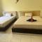 Amed Stop Inn Homestay, Rooftop Restaurant and Bar