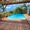 Grande villa dans l'ouest - belle vue mer - piscine - jacuzzi - 4 chambres - jardin - Saint-Gilles-les Hauts