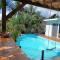 Grande villa dans l'ouest - belle vue mer - piscine - jacuzzi - 4 chambres - jardin - Saint-Gilles-les Hauts
