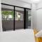 Terraces on Martyn - A Breezy Tropical Pool Retreat
