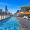 Chic 1-Bed with Harbour Views & Pool by Tram Line
