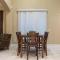 Gated townhouse with 2 suites, heated pool, hot tub