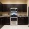 Gated townhouse with 2 suites, heated pool, hot tub