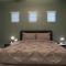 Gated townhouse with 2 suites, heated pool, hot tub