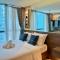 Comfy 1BR At Uptown BGC - Manila