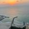 Luxury Room by the Sea Stunning View, King Bed, and Cozy Living Space - Room inside Apartment