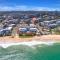 Absolute Beachfront Rolling Surf Resort