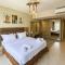 Staggering & Soothing 2 BDR w Pool View Free Pool & Beach Access - 赫尔格达
