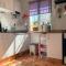 Central Attic Apt Sleeps 4 with Patio
