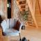 Woodland paradise Charming wooden houses in stone