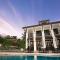 Luxe! Impressively designed 2nd-floor unit in Coco done in red and orange hues - Coco