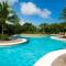 3rd-floor space with modern décor recently renovated viewing over pool in Coco