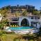 Dreamy Spanish-Style Villa with Sweeping Ocean Views, Elegant Nautical Design & Giant Infinity Pool