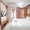 Modern Look and Homey Studio Amartha View Apartment By Travelio - Semarang
