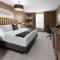 Riverbend Hotel and Suites, Trademark Collection by Wyndham