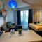Studio Condominium,with pool Nitflex wifi Tambuli Seaside Tower C Seaview balcony 15mins from airport - Lapu Lapu City