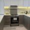 Modern 1-Bed with Rooftop Pool - 5 Minutes from Yas Island & Abu Dhabi Airport - 阿布扎比