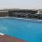Modern 1-Bed with Rooftop Pool - 5 Minutes from Yas Island & Abu Dhabi Airport - 阿布扎比