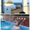 Located by the sea one beachfront Private Captain Lazaros Pool Villa with loft in 750sqm spacious private plot-Jacuzzi-sunrelax-furnished terace-gazebo-private parking,sleep 3 adults and 2 children, just steps from the Black Beach-Seaview - Perissa