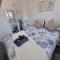 Modern 2-Bed Home - Private Garden Parking & WiFi