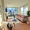 Luxury Condo by River with City Views