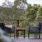 Relax in natures symphony at The Berry Dairy