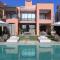 HM50 l Villa en front de golf piscine & jacuzzi - Marrakech