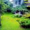 GreenHeart- Family Room-Micro Apartment, AC- Hot W, Garden View, separate Varanda & Dining Area - Travel Awards 2025