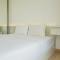 Comfort and Minimalist 2BR at Sky House BSD Apartment By Travelio - 当格浪