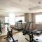 Cozy Living Studio Apartment at Belmont Residence Puri By Travelio