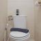 Cozy Living Studio Apartment at Belmont Residence Puri By Travelio