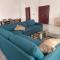 Lumineuse loge privée de 4 chambres en air de plage - Cotonou
