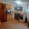 Studio cu bucatarie , baie , scara interioara , etaj cu dormitor openspace , curte cu grill, terasa
