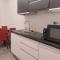Smart Room Abbadia S S - Camere LuxuryModernStyle con Cucina Condivisa