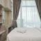 Minimalist and Nice Studio at Tree Park City Cikokol Apartment By Travelio - 当格浪