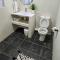 Angazi Guesthouse Unit 2 - Upmarket one bedroom apartment with pool