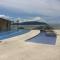 Vista Mar Unlimited Frente Mar Ar Condicionado Garagem Arrumação Andar Alto e piscina aquecida, sauna e muito mais!