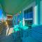 Balcony w Bay View Shared Pool Boat Dock Fat Flounder by AvantStay
