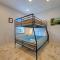 6BDR Balcony w Bay View Shared Pool Boat Dock Keeper Red by AvantStay