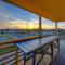 6BDR Balcony w Bay View Shared Pool Boat Dock Keeper Red by AvantStay
