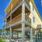 6BDR Balcony w Bay View Shared Pool Boat Dock Keeper Red by AvantStay