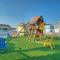 Shared Resort-Style Pool Playground Patio w Bar Tidal Times by AvantStay - Порт-Аранзас