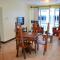 Cowrie Shell Beach Apartments Official