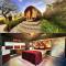 Wellness Tuin - Boudoir Suite - Ultieme Partner Beleving met Jacuzzi en Openhaard en privé Sauna in Romantische stijl - Horst