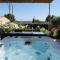 Vacation rental in the Alpilles, Provence, close to the village center - Beautiful view -Air conditionning Heated pool and spa - sleeps 8
