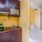 Cozy and Homey Studio Apartment at Metropark Condominium Jababeka By Travelio - 贝克西