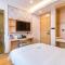 Dequan Luxury Hotel Communication University of China Branch Coffee, fruits, snacks, a gym and a laundry room are provided for free in the lobby - Pékin
