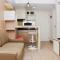 Comfort and Homey 2BR at Springlake Apartment Bekasi By Travelio