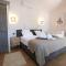 provencal house with heated pool, view of the luberon in robion - accommodates 12 people.