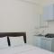 Comfort Studio at Green Pramuka City Apartment near Shopping Center By Travelio